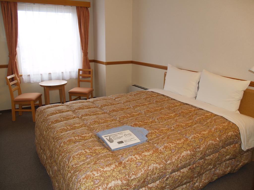 Hotel Route-Inn Fukui Ekimae Zimmer foto