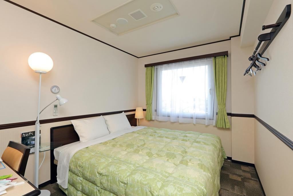 Hotel Route-Inn Fukui Ekimae Zimmer foto